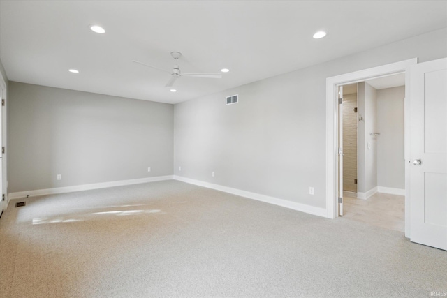 spare room with ceiling fan