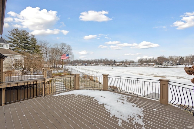 view of snow covered deck