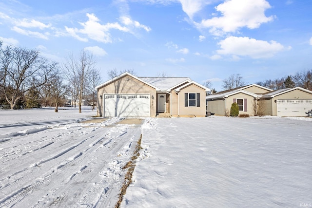 ranch-style house featuring a garage