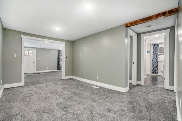 unfurnished room with carpet floors