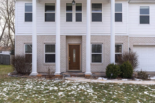 view of front of property with a garage