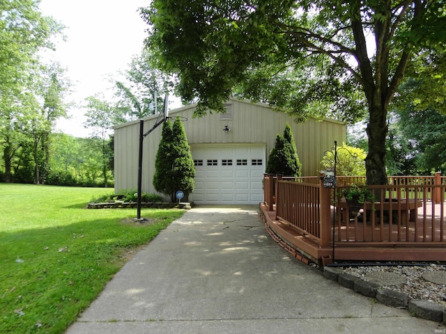 garage featuring a lawn