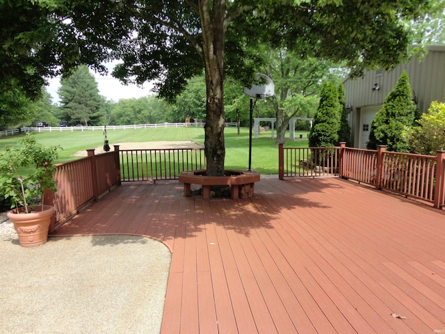 deck featuring a lawn