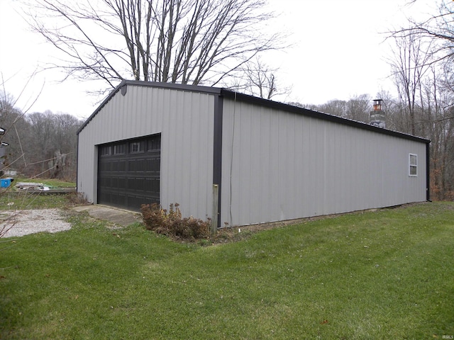 garage with a lawn