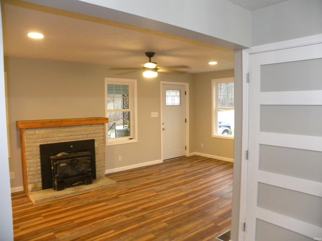 unfurnished living room featuring built in features, ceiling fan, and wood-type flooring