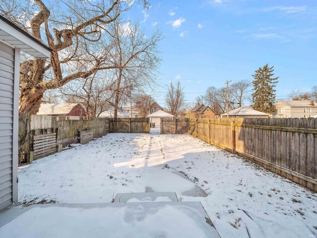 view of yard covered in snow