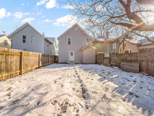 view of snow covered property