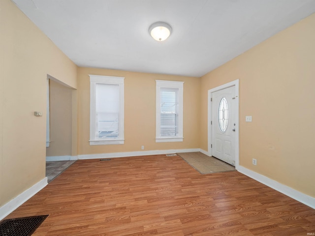 foyer with light wood-type flooring