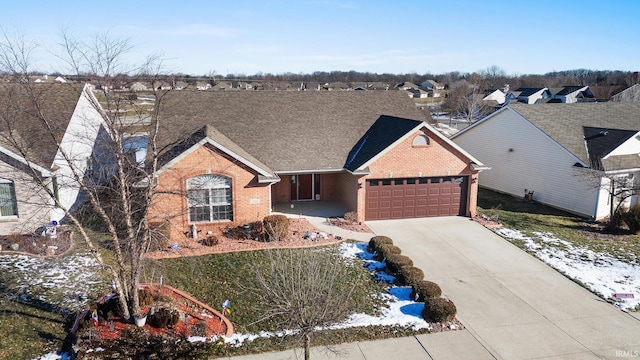 ranch-style home featuring a garage