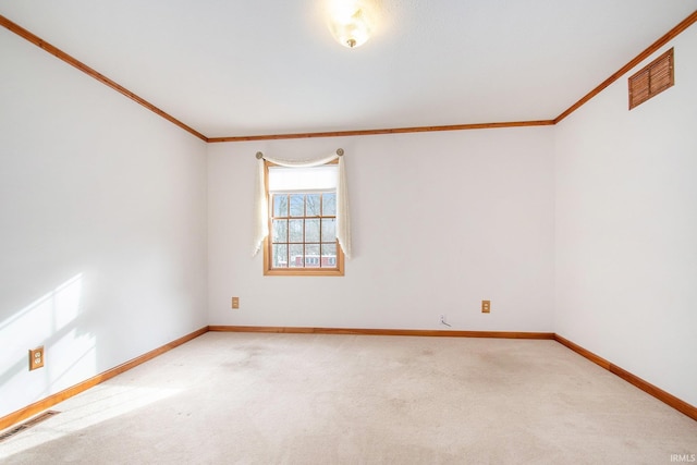 empty room with carpet floors and ornamental molding