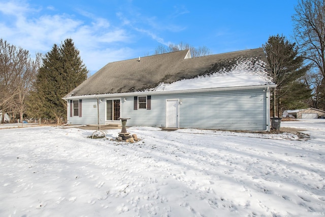 view of snow covered property