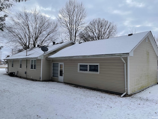 view of snow covered house