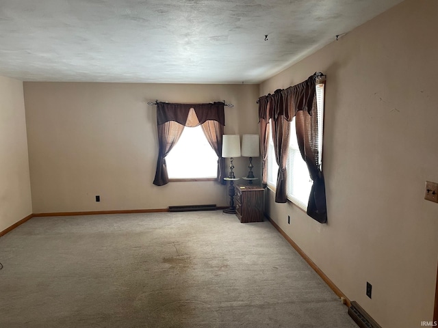 empty room featuring light colored carpet