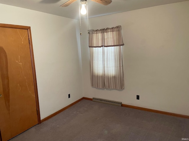 carpeted empty room featuring ceiling fan