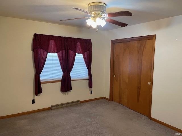 unfurnished bedroom with light colored carpet, a closet, and ceiling fan