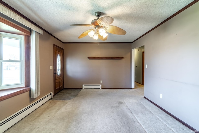 unfurnished room with a textured ceiling, light colored carpet, a baseboard heating unit, and ornamental molding