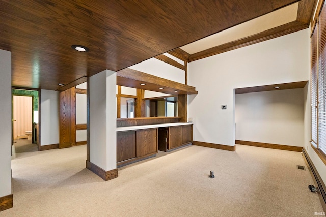 interior space featuring light colored carpet and wood ceiling