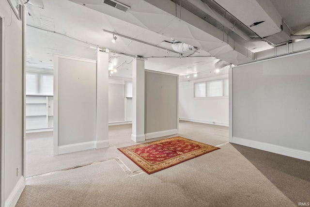 basement featuring carpet and a wealth of natural light