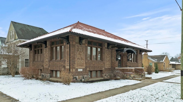 view of snow covered property