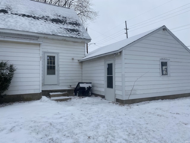 view of snow covered property