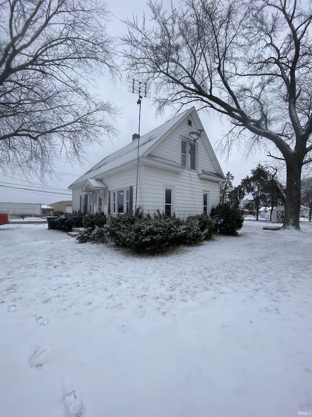 view of snow covered property