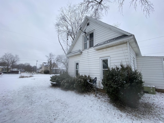 view of snow covered property