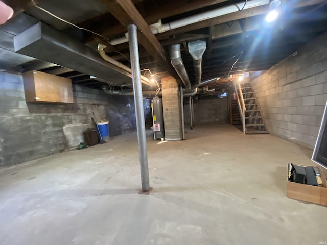 basement featuring water heater