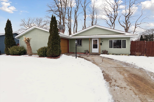 single story home featuring a garage