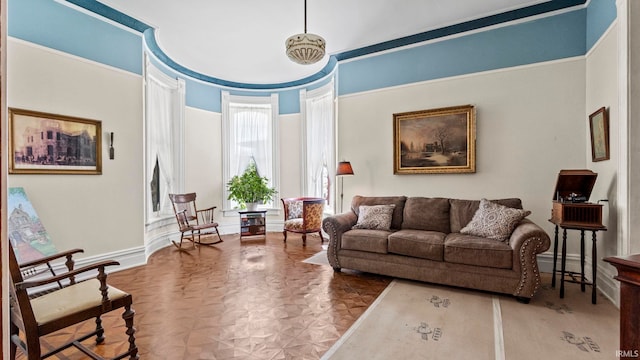 living room featuring parquet floors