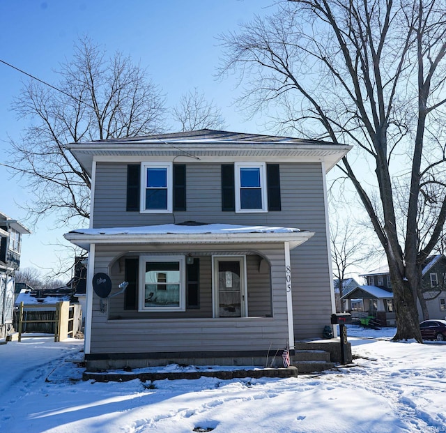 view of front property featuring covered porch