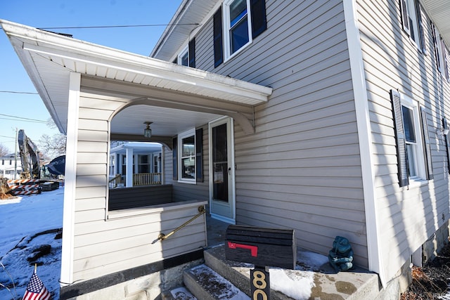 view of home's exterior with covered porch