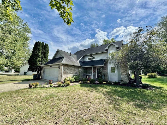 view of front property with a porch, a garage, and a front lawn