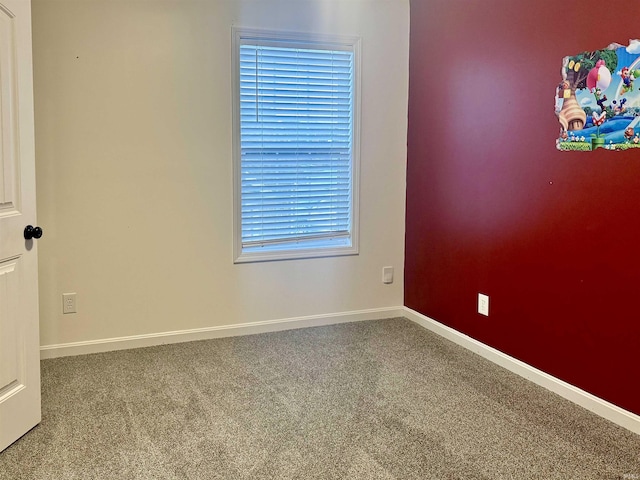 empty room featuring carpet floors