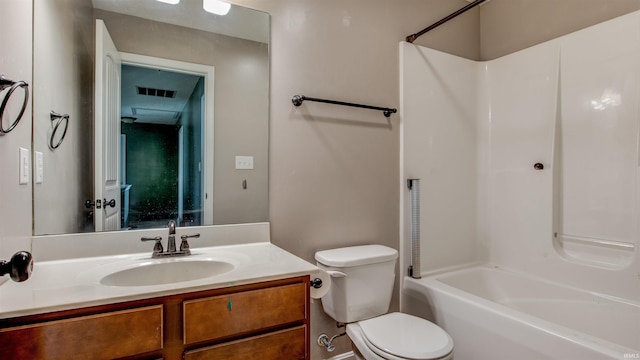 full bathroom featuring shower / bathtub combination, toilet, and vanity