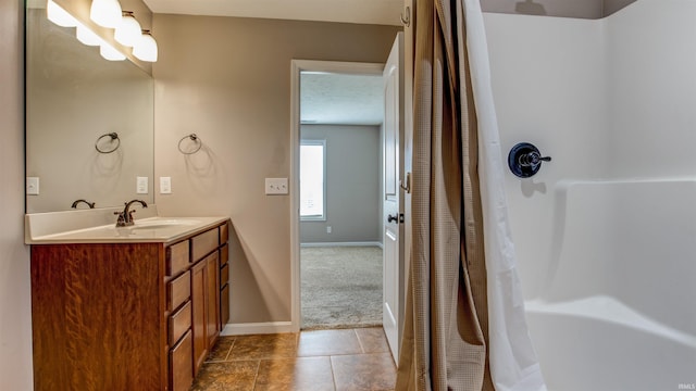 bathroom with vanity, tile patterned floors, and a shower with shower curtain