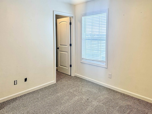 empty room featuring carpet