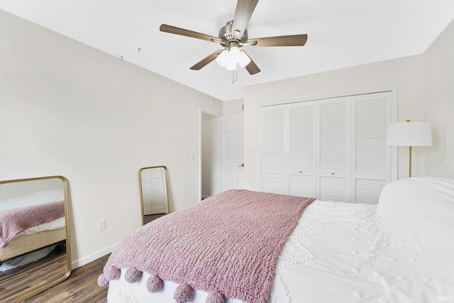 bedroom featuring ceiling fan, hardwood / wood-style floors, and a closet