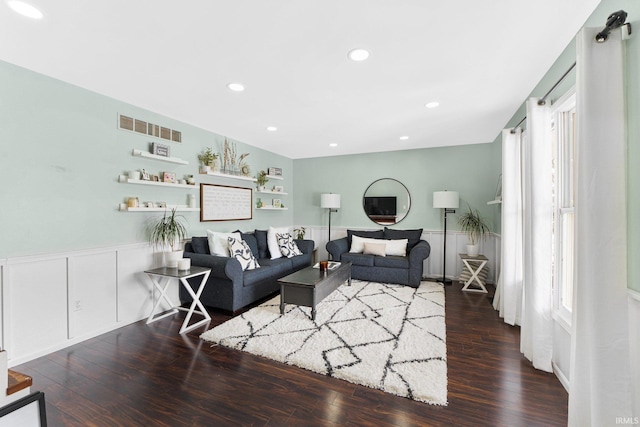 living room with dark hardwood / wood-style floors