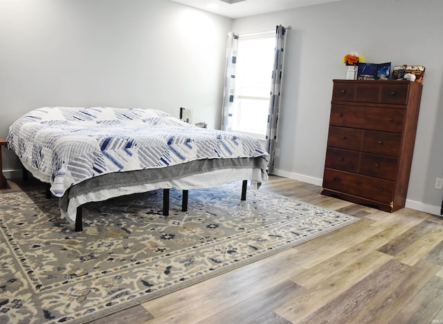 bedroom featuring light hardwood / wood-style flooring