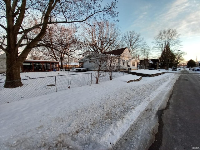 view of yard layered in snow