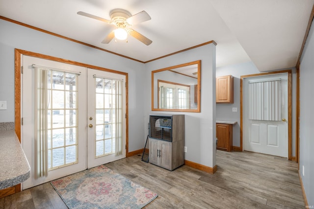 entryway featuring light hardwood / wood-style floors, french doors, and ceiling fan