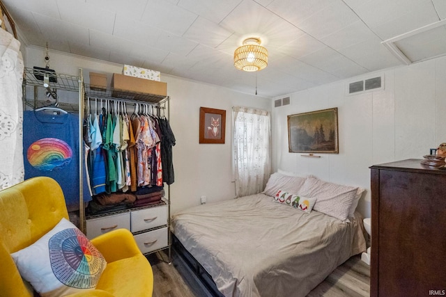 bedroom featuring wood-type flooring