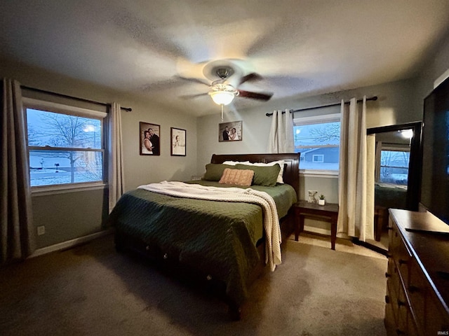 bedroom featuring ceiling fan and carpet flooring