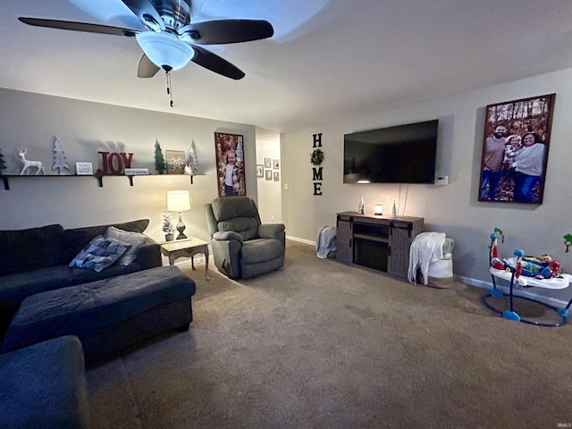 living room with ceiling fan and carpet floors