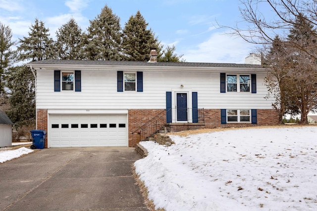 split foyer home featuring a garage