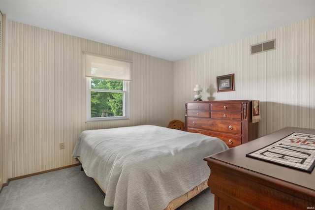 bedroom with light carpet