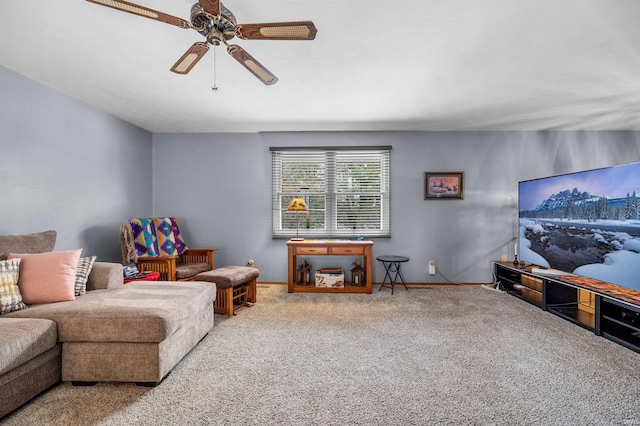 carpeted living room featuring ceiling fan