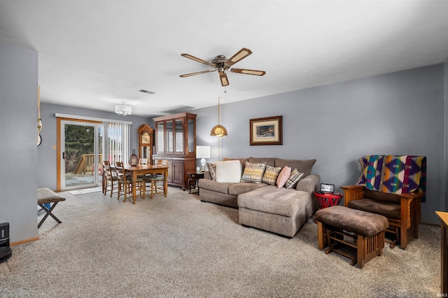 living room featuring ceiling fan