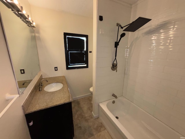 full bathroom featuring tiled shower / bath combo, vanity, and toilet