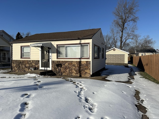 view of front of home with an outbuilding and a garage